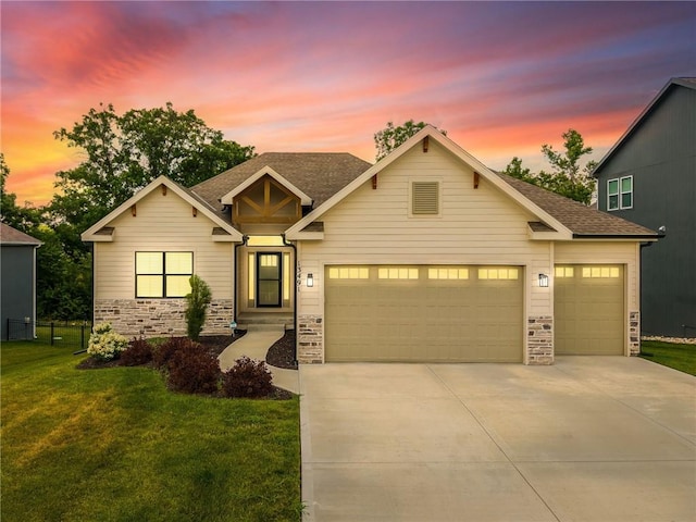 13491 Terrace Park Dr, Parkville, MO 64152 - craftsman house featuring stone siding, driveway, an attached garage, and a lawn