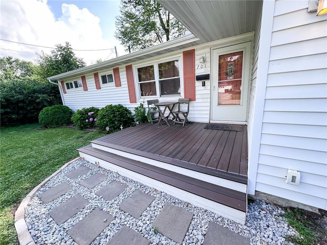 701 N Godfrey St, Cameron, MO 64429 - wooden terrace with a lawn