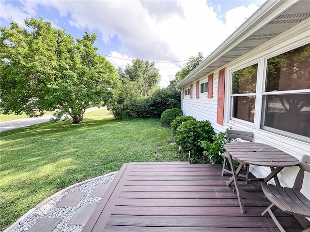 701 N Godfrey St, Cameron, MO 64429 - wooden deck with a lawn