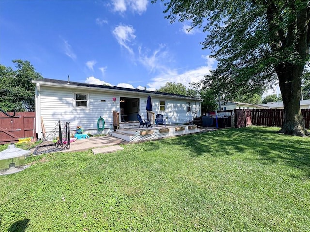 701 N Godfrey St, Cameron, MO 64429 - rear view of property featuring a patio and a fenced backyard