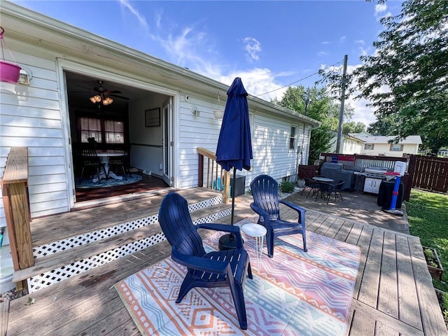 701 N Godfrey St, Cameron, MO 64429 - wooden deck with outdoor dining area