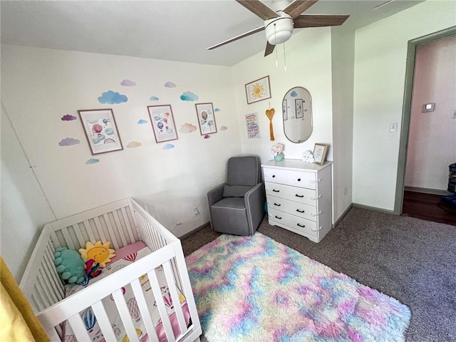 701 N Godfrey St, Cameron, MO 64429 - bedroom featuring carpet floors, a crib, and a ceiling fan