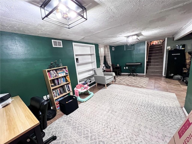 701 N Godfrey St, Cameron, MO 64429 - office with a textured ceiling