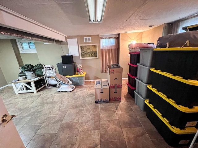 701 N Godfrey St, Cameron, MO 64429 - below grade area featuring baseboards