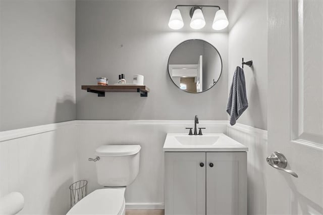 16122 W 157th St, Olathe, KS 66062 - half bathroom featuring a wainscoted wall and vanity