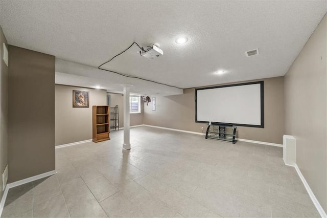 16122 W 157th St, Olathe, KS 66062 - home theater room featuring a textured ceiling and recessed lighting