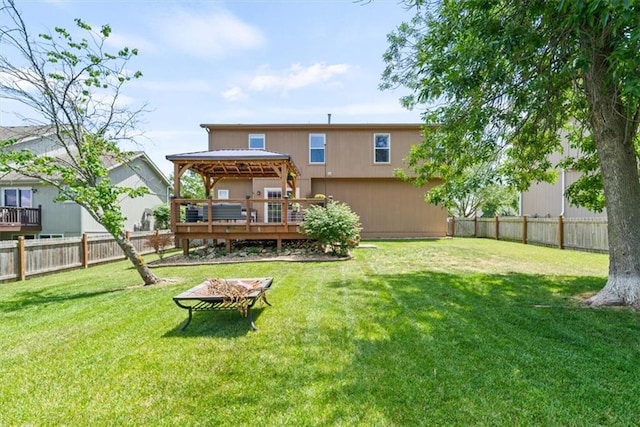 16122 W 157th St, Olathe, KS 66062 - back of house featuring a gazebo, a fire pit, a fenced backyard, and a wooden deck