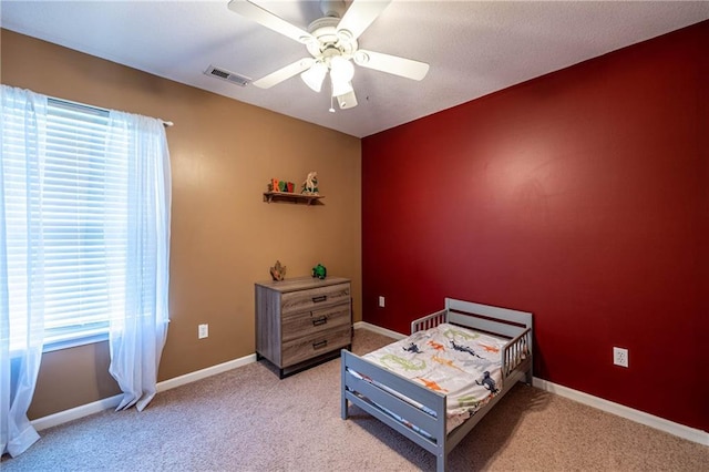 61 SW 446th Rd, Clinton, MO 64735 - bedroom featuring light carpet and ceiling fan