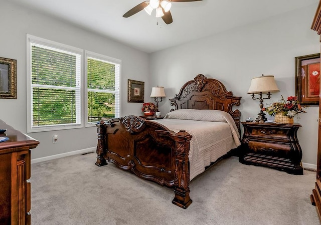 2214 SW 9th St, Blue Springs, MO 64014 - carpeted bedroom with baseboards and ceiling fan