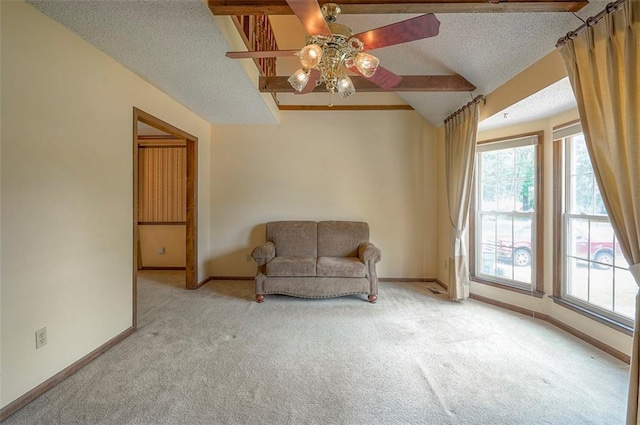 16327 W Locust St, Olathe, KS 66062 - living area with a textured ceiling, light colored carpet, ceiling fan, and vaulted ceiling