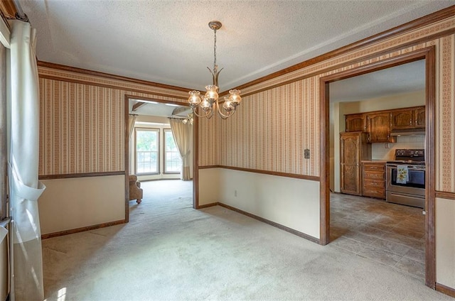 16327 W Locust St, Olathe, KS 66062 - unfurnished dining area featuring wallpapered walls, a chandelier, light colored carpet, a textured ceiling, and ornamental molding
