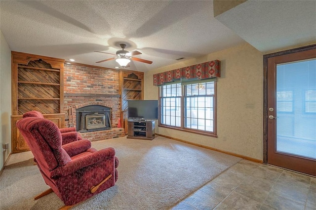 16327 W Locust St, Olathe, KS 66062 - carpeted living room with a textured ceiling, a ceiling fan, and built in shelves