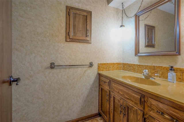 16327 W Locust St, Olathe, KS 66062 - bathroom with vanity and decorative backsplash