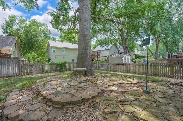 16327 W Locust St, Olathe, KS 66062 - fenced backyard featuring a patio area and a residential view