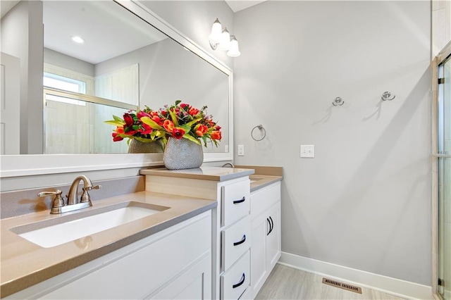 23103 W 125th Ter, Olathe, KS 66016 - full bathroom with double vanity and an enclosed shower