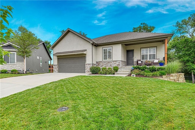 23103 W 125th Ter, Olathe, KS 66016 - view of front facade featuring stucco siding, stone siding, an attached garage, driveway, and a front lawn