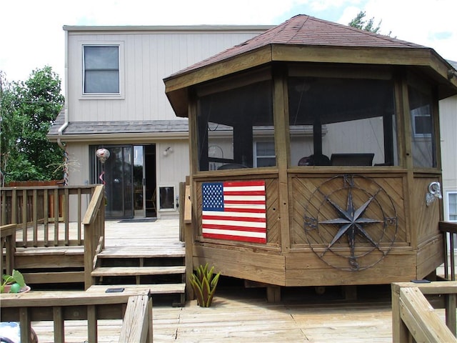 8265 Gleason Rd, Lenexa, KS 66227 - back of property featuring a wooden deck
