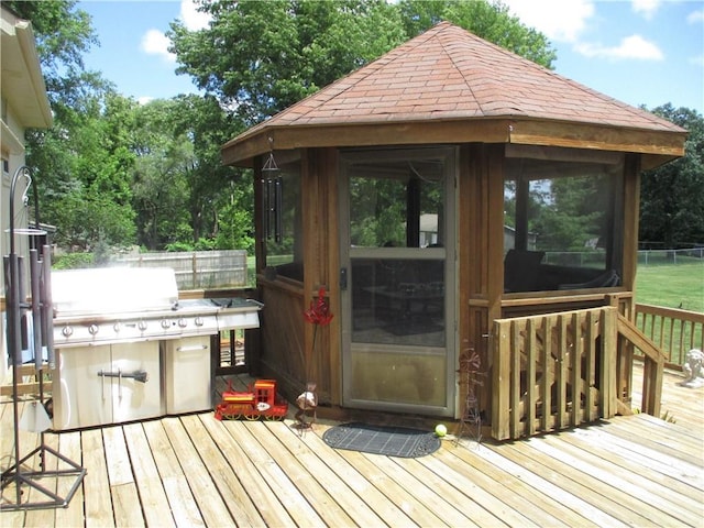 8265 Gleason Rd, Lenexa, KS 66227 - deck featuring view of scattered trees