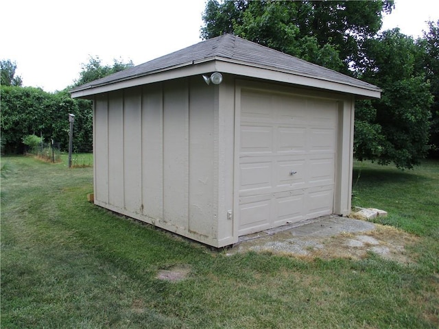 8265 Gleason Rd, Lenexa, KS 66227 - garage featuring a shed