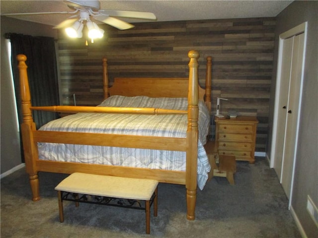 8265 Gleason Rd, Lenexa, KS 66227 - bedroom featuring carpet floors, wooden walls, and a ceiling fan