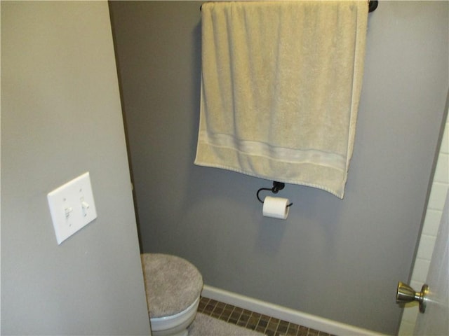 8265 Gleason Rd, Lenexa, KS 66227 - bathroom with baseboards and tile patterned flooring