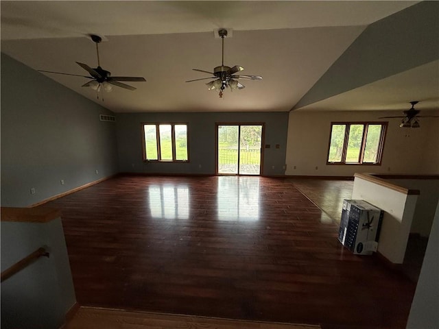 1011 N Arrowhead Dr, Burlington, KS 66839 - unfurnished living room featuring ceiling fan, wood finished floors, and high vaulted ceiling