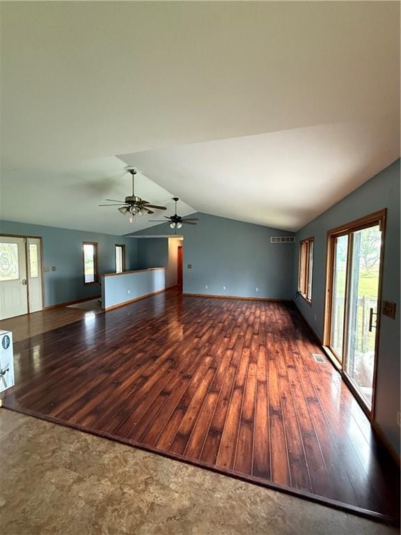 1011 N Arrowhead Dr, Burlington, KS 66839 - unfurnished living room with lofted ceiling, hardwood / wood-style floors, plenty of natural light, and ceiling fan