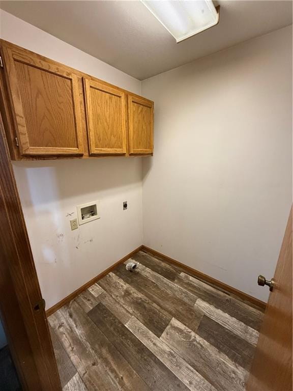 1011 N Arrowhead Dr, Burlington, KS 66839 - washroom with cabinet space, hookup for an electric dryer, hookup for a washing machine, and dark wood-style floors