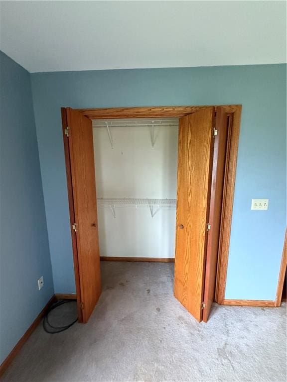 1011 N Arrowhead Dr, Burlington, KS 66839 - unfurnished bedroom featuring carpet floors and a closet