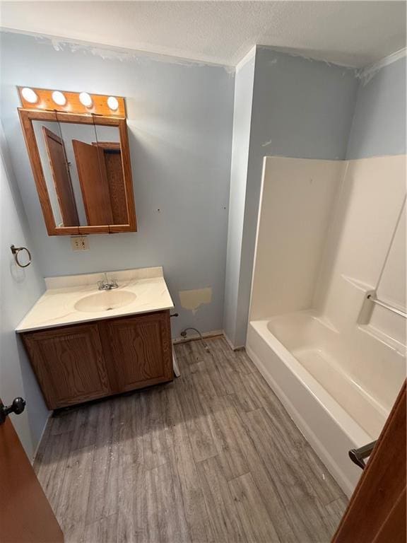 1011 N Arrowhead Dr, Burlington, KS 66839 - full bathroom with wood finished floors and vanity