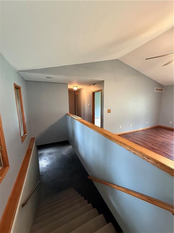 1011 N Arrowhead Dr, Burlington, KS 66839 - stairs featuring lofted ceiling