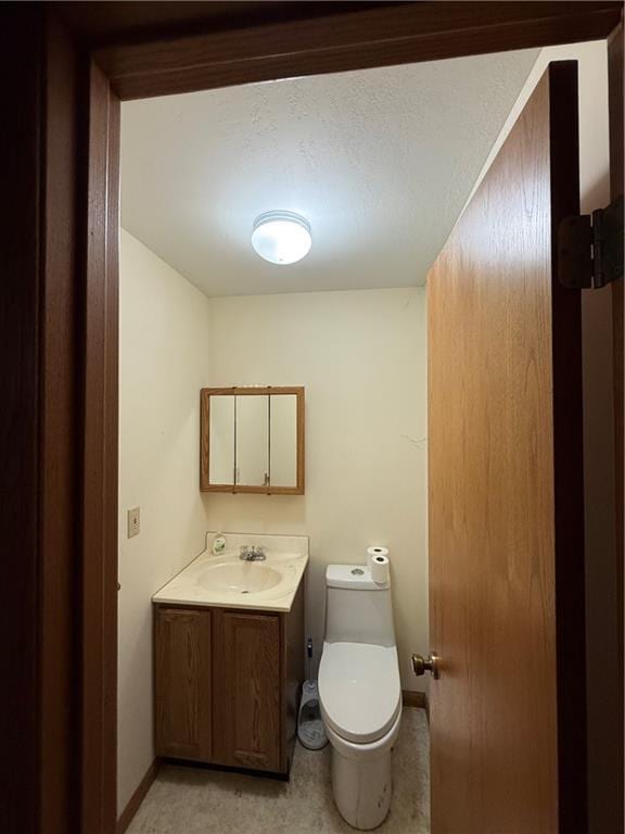 1011 N Arrowhead Dr, Burlington, KS 66839 - half bathroom featuring vanity and toilet