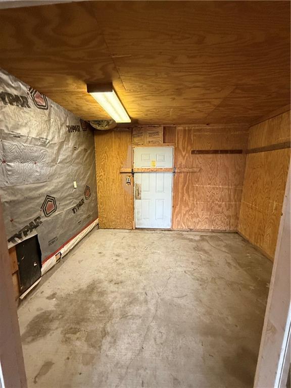1011 N Arrowhead Dr, Burlington, KS 66839 - below grade area with wooden ceiling