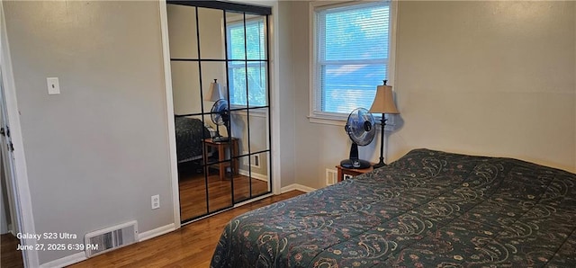 4501 E 105th St, Kansas City, MO 64137 - bedroom with wood finished floors and baseboards