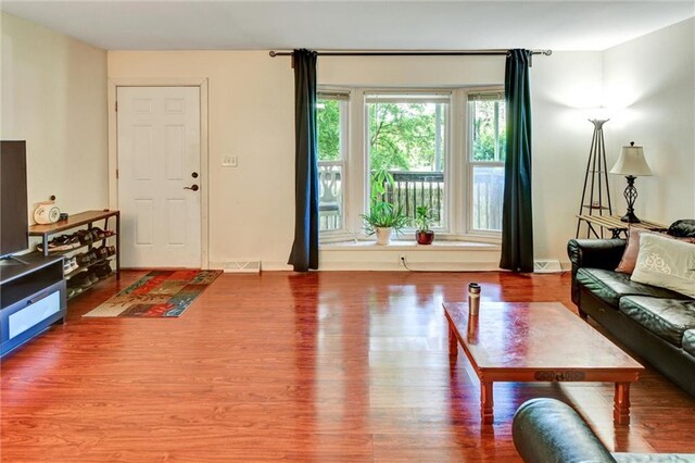 16128 Midland Dr, Shawnee, KS 66217 - living area featuring wood finished floors
