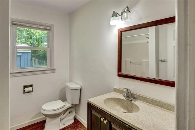 16128 Midland Dr, Shawnee, KS 66217 - bathroom with vanity and wood finished floors