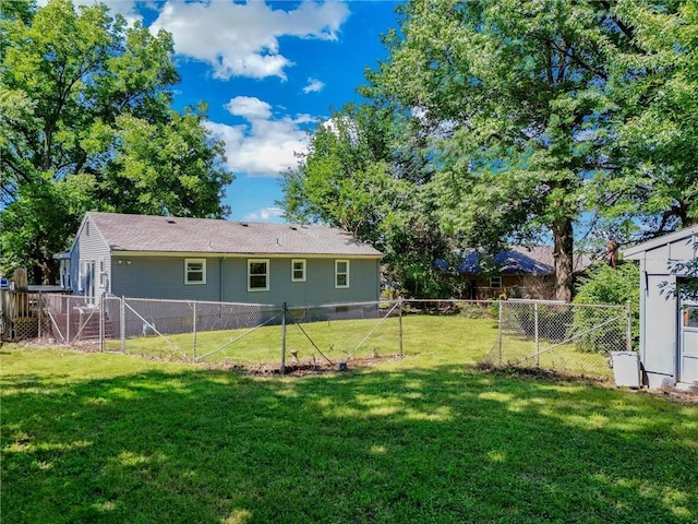 16128 Midland Dr, Shawnee, KS 66217 - rear view of house featuring a fenced backyard