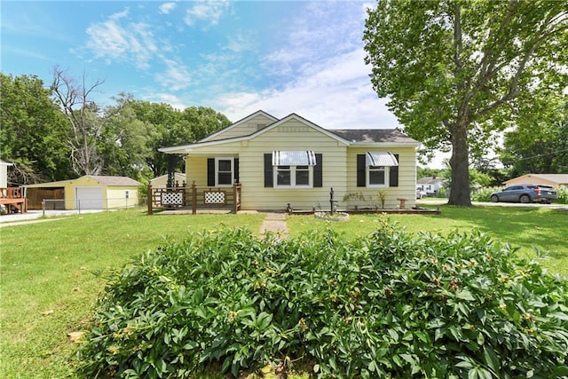 2731 S Northern Blvd, Independence, MO 64052 - bungalow-style home with a garage