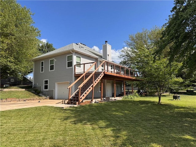 200 S Park Dr, Raymore, MO 64083 - rear view of house featuring a chimney, stairs, a wooden deck, an attached garage, and driveway