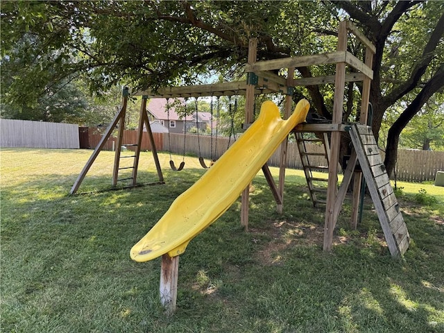 200 S Park Dr, Raymore, MO 64083 - view of play area with a fenced backyard