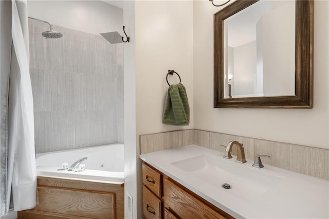200 S Park Dr, Raymore, MO 64083 - bathroom featuring vanity and a combined bath / shower with jetted tub