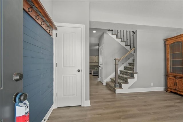 801 NW Hickory Ridge Dr, Grain Valley, MO 64029 - foyer featuring stairway and wood finished floors