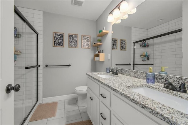 801 NW Hickory Ridge Dr, Grain Valley, MO 64029 - bathroom featuring a shower stall and double vanity