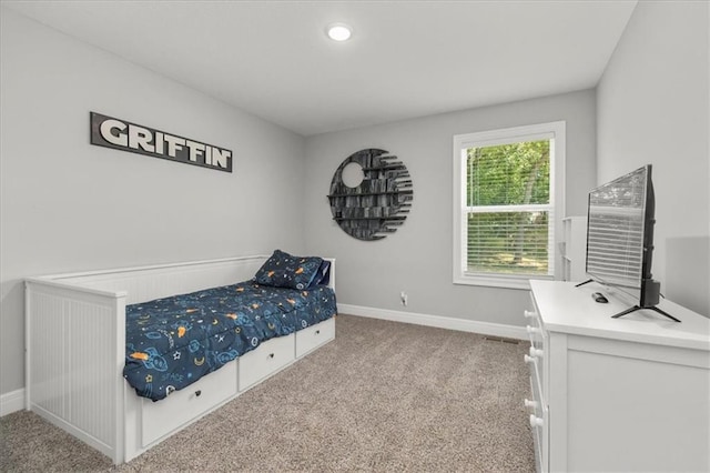 801 NW Hickory Ridge Dr, Grain Valley, MO 64029 - carpeted bedroom featuring baseboards and recessed lighting