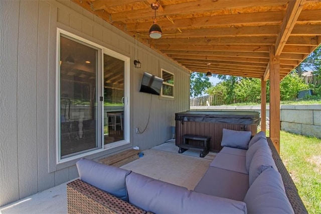 801 NW Hickory Ridge Dr, Grain Valley, MO 64029 - view of patio / terrace with a hot tub
