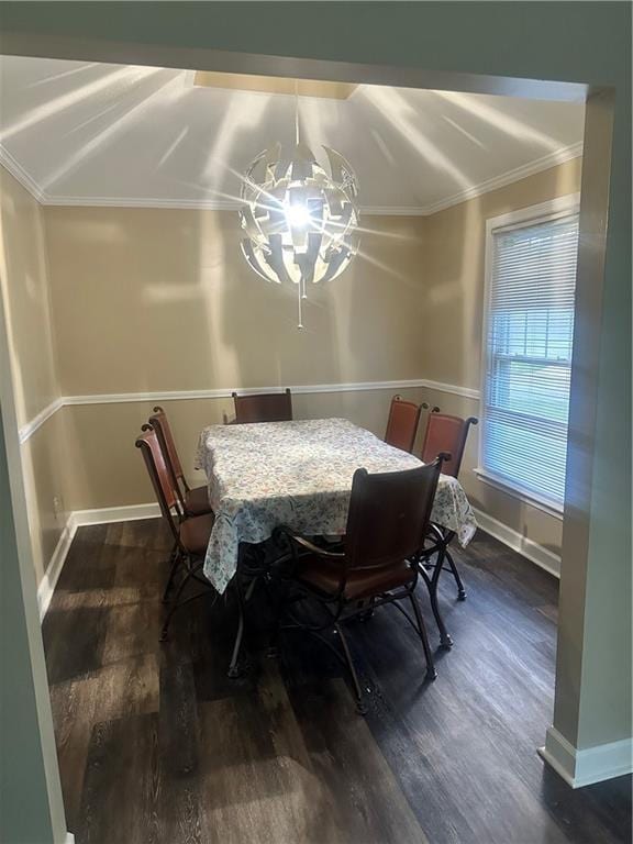 12621 E 41st Ter S, Independence, MO 64055 - dining room with a chandelier, dark wood-style flooring, and crown molding