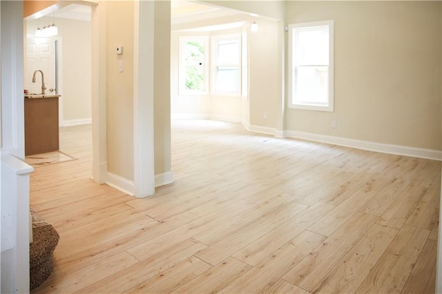 3635 Wabash Ave, Kansas City, MO 64109 - empty room featuring light wood-style floors and baseboards