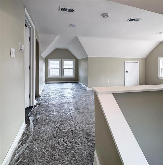3635 Wabash Ave, Kansas City, MO 64109 - additional living space featuring lofted ceiling and baseboards