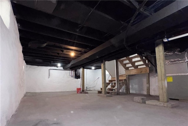 3635 Wabash Ave, Kansas City, MO 64109 - unfinished basement featuring stairs