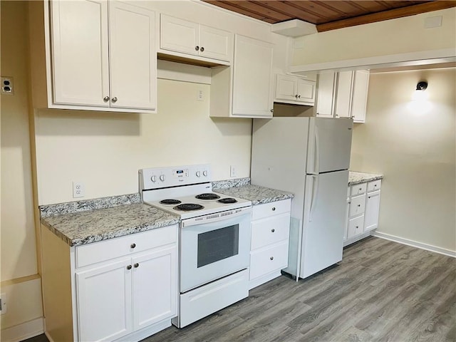 812 N 9th St, Leavenworth, KS 66048 - kitchen with white appliances, wood ceiling, white cabinets, light wood-style floors, and light stone counters